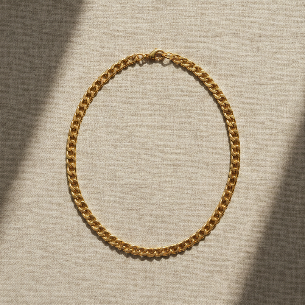 チェーン ── 18 金イエローゴールド、フラット・カーブ・リンク、ヴィチェンツァ製。